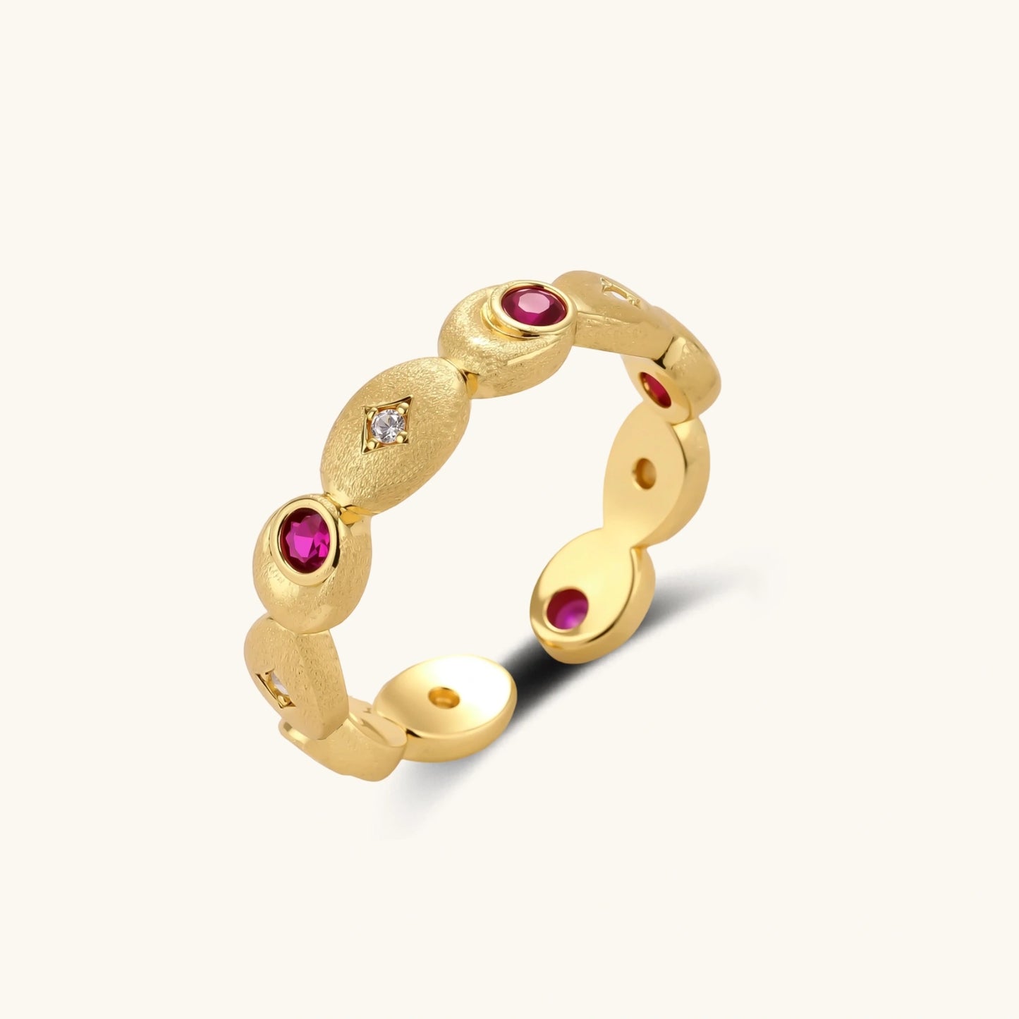 Gold-plated adjustable ring featuring alternating red and clear zircon stones set in geometric oval elements