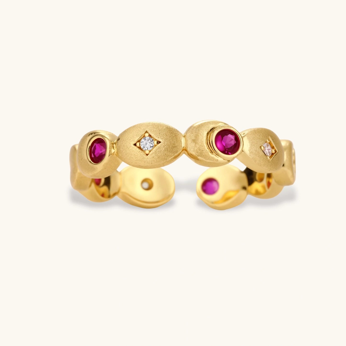 Gold-plated adjustable ring featuring alternating red and clear zircon stones set in geometric oval elements