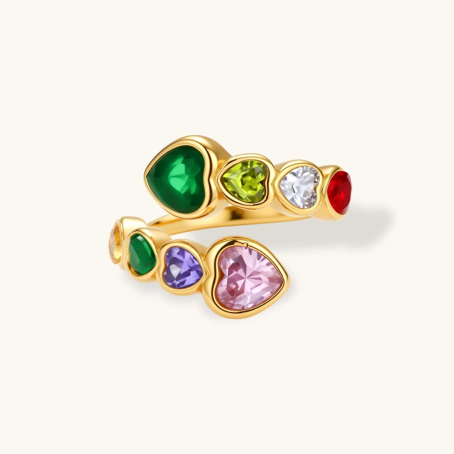 Gold-plated wrap ring with bezel-set multicolor heart-shaped cubic zirconia stones in pink, purple, green, red, yellow, and white.
