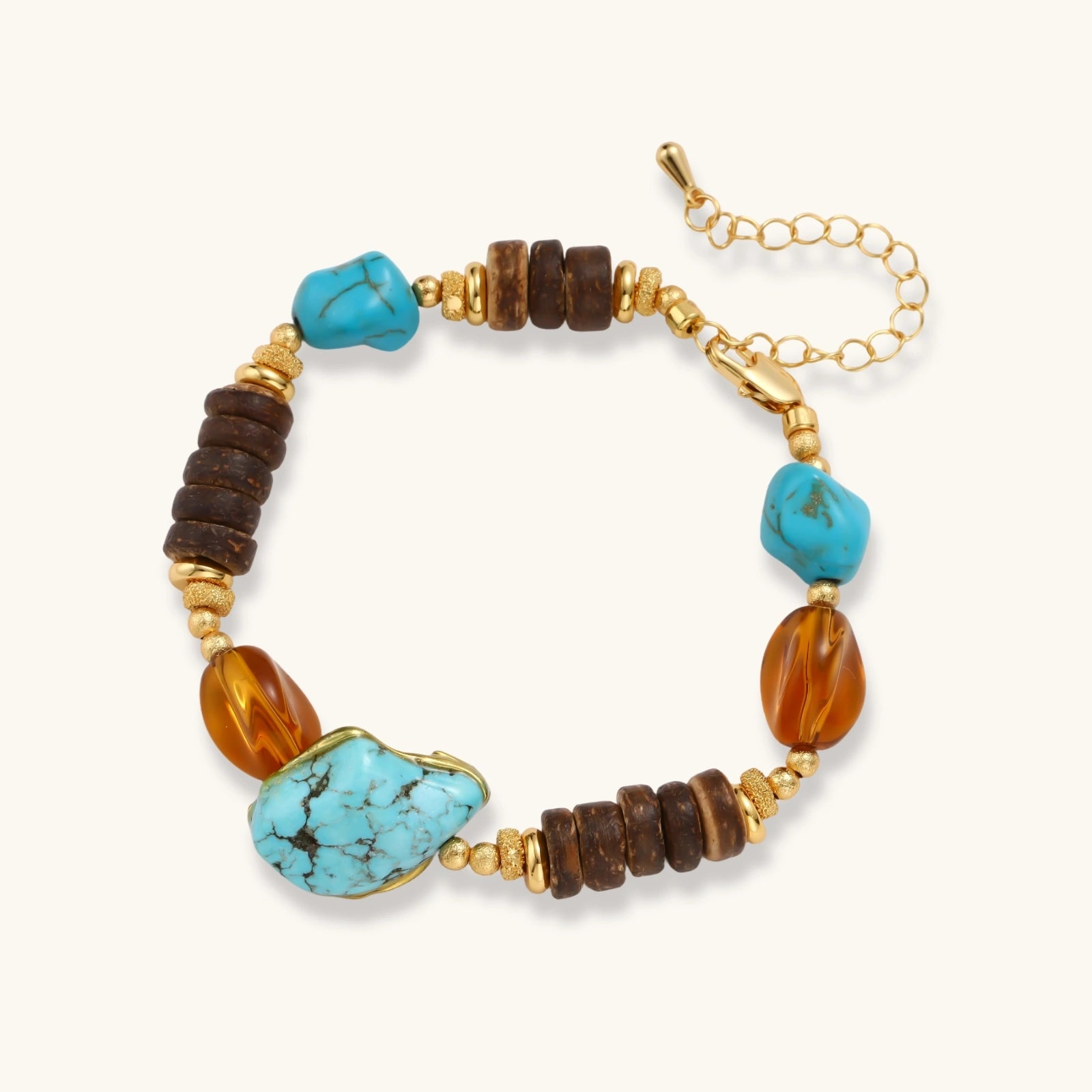 Mixed-material bracelet with turquoise stones, wooden beads, and 18k gold-plated copper elements on white background.